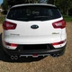 Накладка на задний бампер Kia Sportage Киа Спортейдж диффузор универсальный цвет черно серебристый - изображение 2