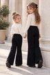 Штани мікровельветові «Cozy Flare» Kiddo Чорний розмір 98 (KIDDO-D513A7BF2BA94A6C81BD18D30B42880B) - зображення 2
