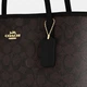 Сумка Coach Medium City Tote Bag in Signature Canvas коричнева середнього розміру - изображение 2