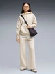Спортивные штаны на флисе женские Puma ESS Wide Leg Pants 69291982 XS Бежевые (4070033450574) - изображение 3