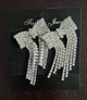 Жіночі сережки "Бантик" 5.4 см jewelry Сріблясті - зображення 3