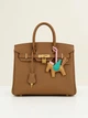 Жіноча сумка Hermès Birkin 30 30*26*14 см Gold коричнево-гірчична (Gold/Camel) з золотою фурнітурою та підвіскою-конячкою. - изображение 1