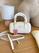 Жіноча сумка Miu Miu Arcadie Leather Bag 22*11*8 см молочного/кремового кольору з гладкої натуральної шкіри зі золотистою фурнітурою та тисненим логотипом. - изображение 10