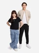 Детская футболка для девочек Calvin Klein 158684846 128 см Черная (1159854963) - изображение 4