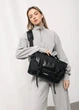 Жіноча сумка для ноутбука Sambag 33х26х11 см екошкіра з перфорацією чорна - зображення 1