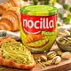 Паста молочно-фісташкова Nocilla Pistacho з шматочками фісташок 180 г Іспанія (8410014517531) - зображення 1