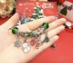Новорічний адвент-календар прикрас та шармів Merry Christmas на 24 сюрпризи — Дитячий набір для створення 2 браслетів з новорічним дизайном - зображення 2