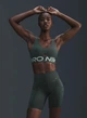 Спортивний топ жіночий Nike Np Indy Plunge Bra Bold M зелений HF7324-844 - зображення 1