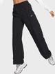Спортивні штани жіночі Nike W Trend Wvn Mr Pant FQ3588-010 M Чорні (196974845270) - зображення 1