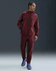 Брюки чоловічі Nike Tech Woven XL Рожевий HM8241-619 - зображення 1