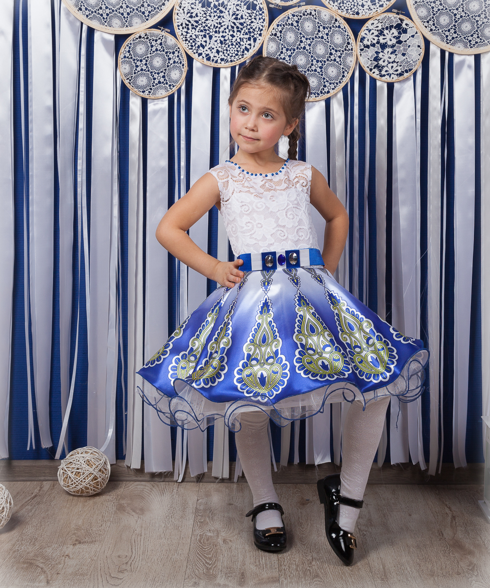 

Детское нарядное платье I.V.A.moda Жар-птица 32 голубой iva-508