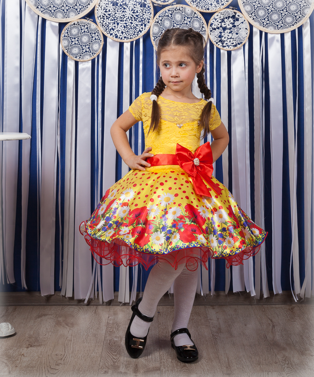 

Детское нарядное платье I.V.A.moda Маки 32 желтый iva-505