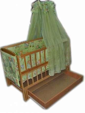Детская кроватка Baby Малыш Olch с маятниковым механизмом и выдвижным ...