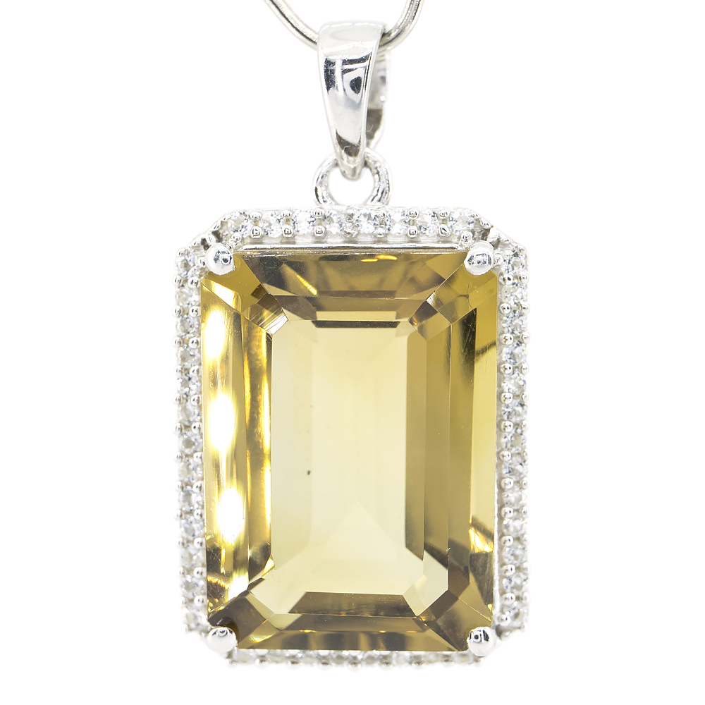 

Серебряная подвеска 925пр 5,49г с болей. гелиодором, топаз. 14,51к #204839.