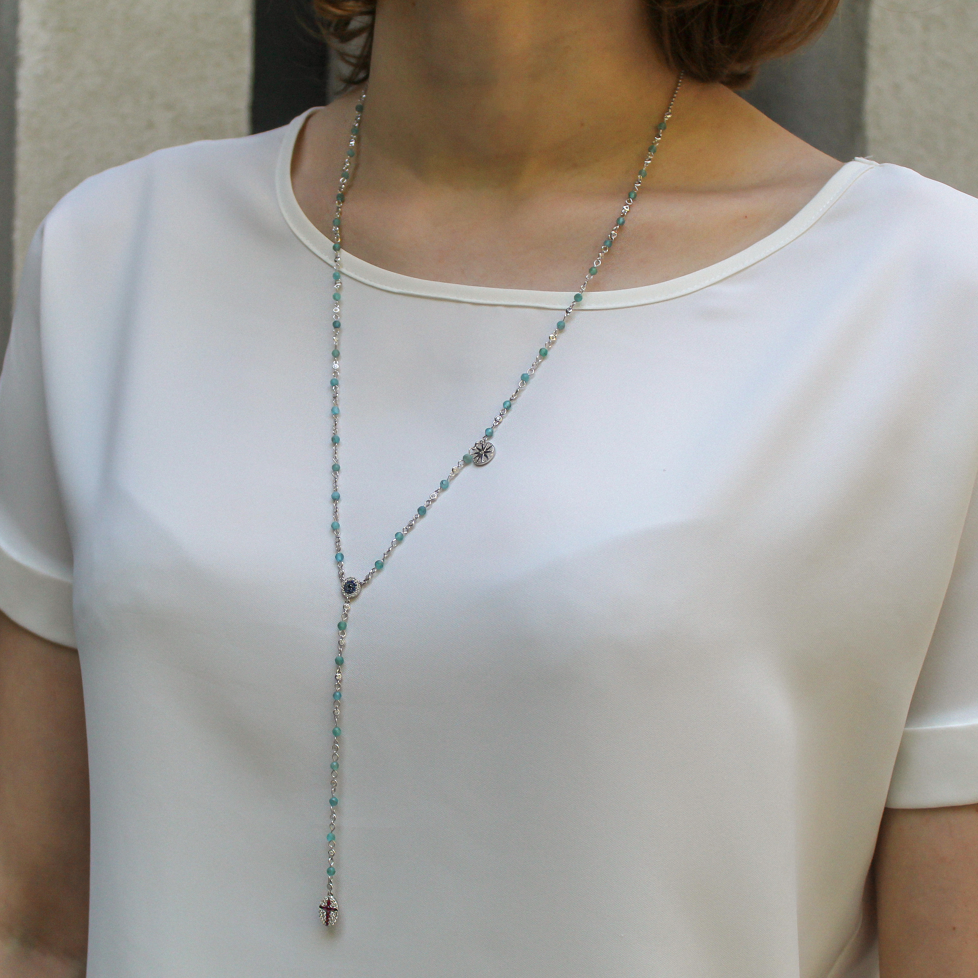 

Серебряное колье-галстук с бирюзовыми фианитами KO14293 Диамант, 55 размер