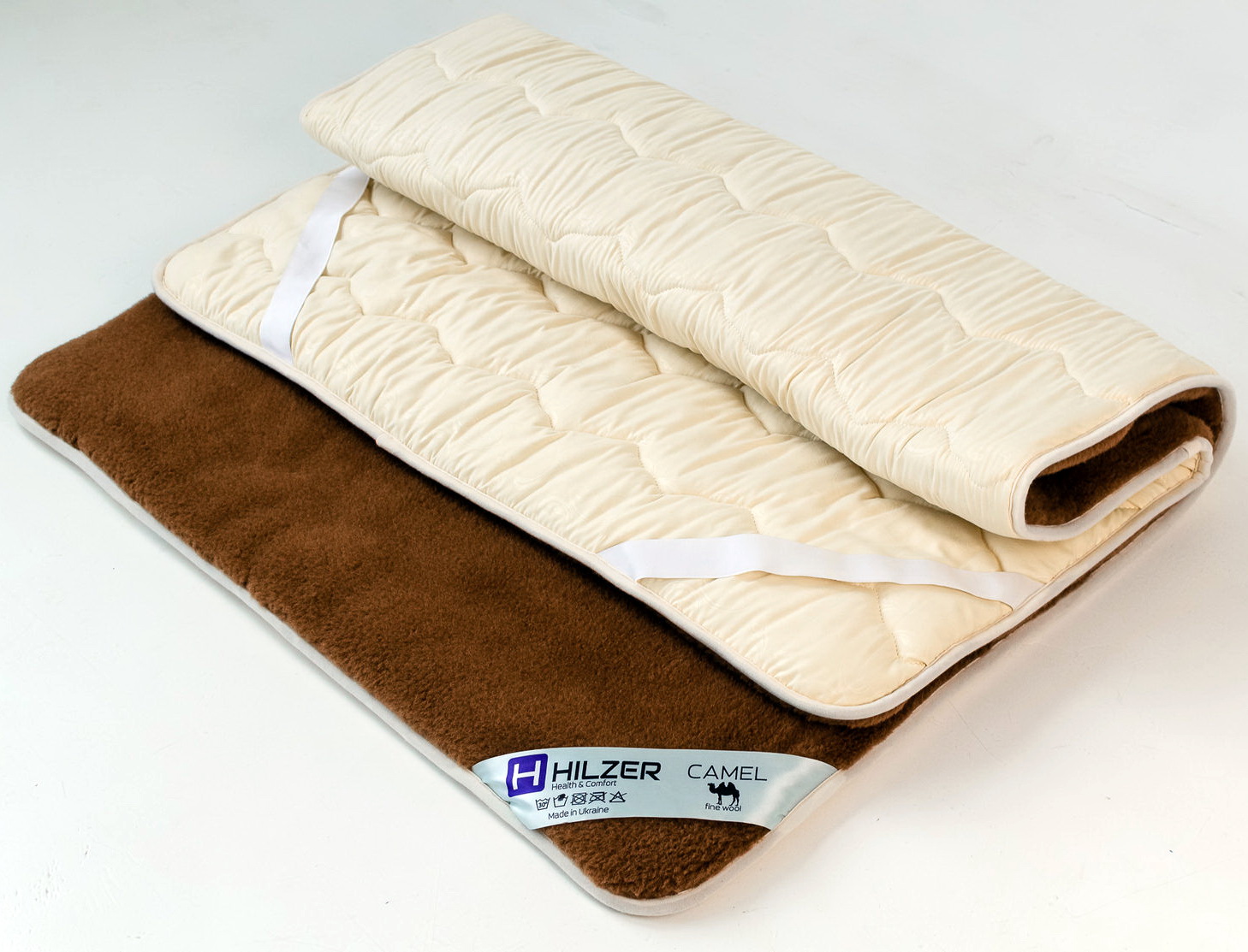 

Наматрацник HILZER 160х200 з шерстяного італійського полотна Woolmark та з резинкою на кутах