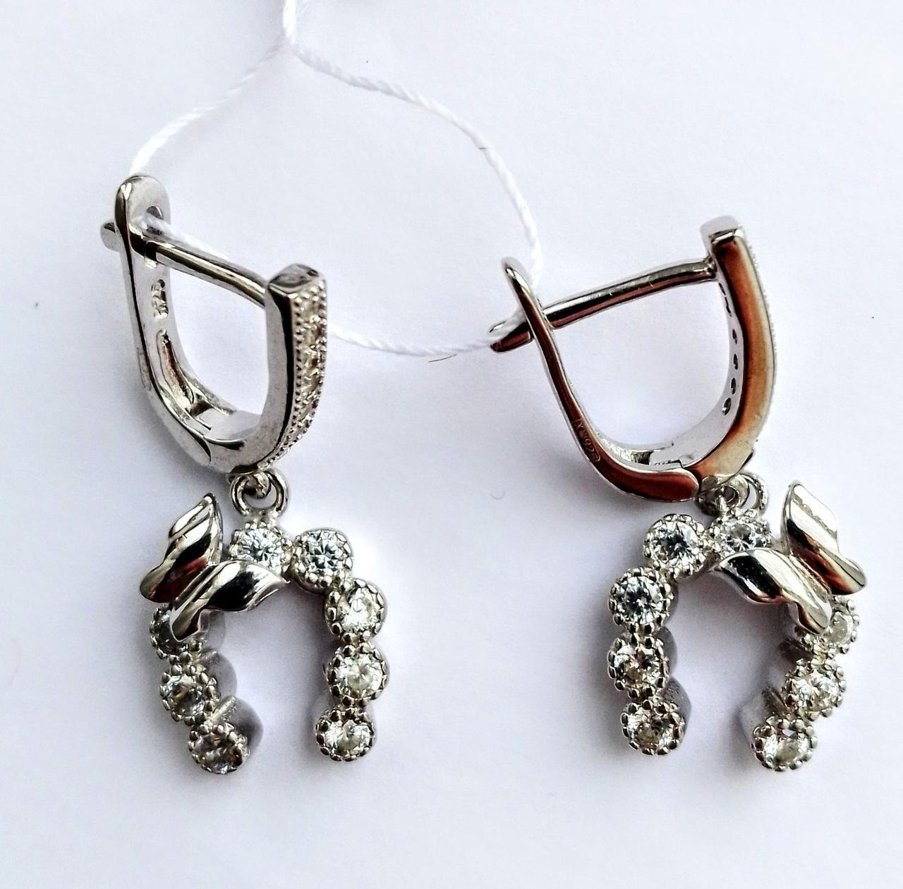 

Серебряные серьги подкова с цирконами 098450