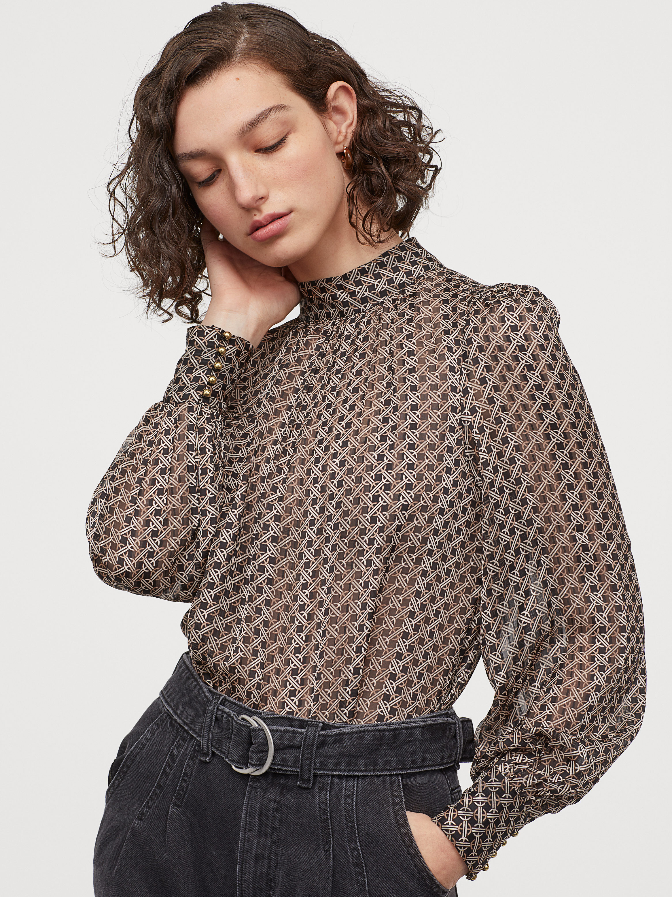 

Блузка H&M 0768465-0 38 Черная узор