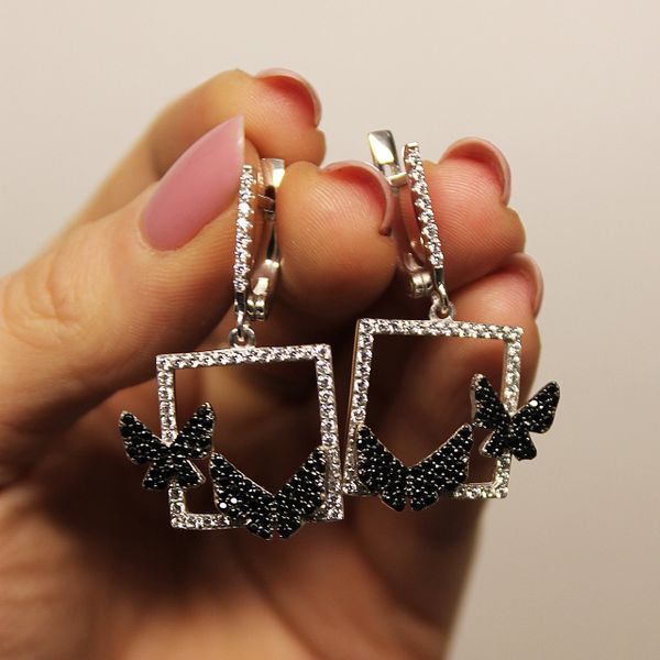 

Срібні сережки "Butterflies flying Black"
