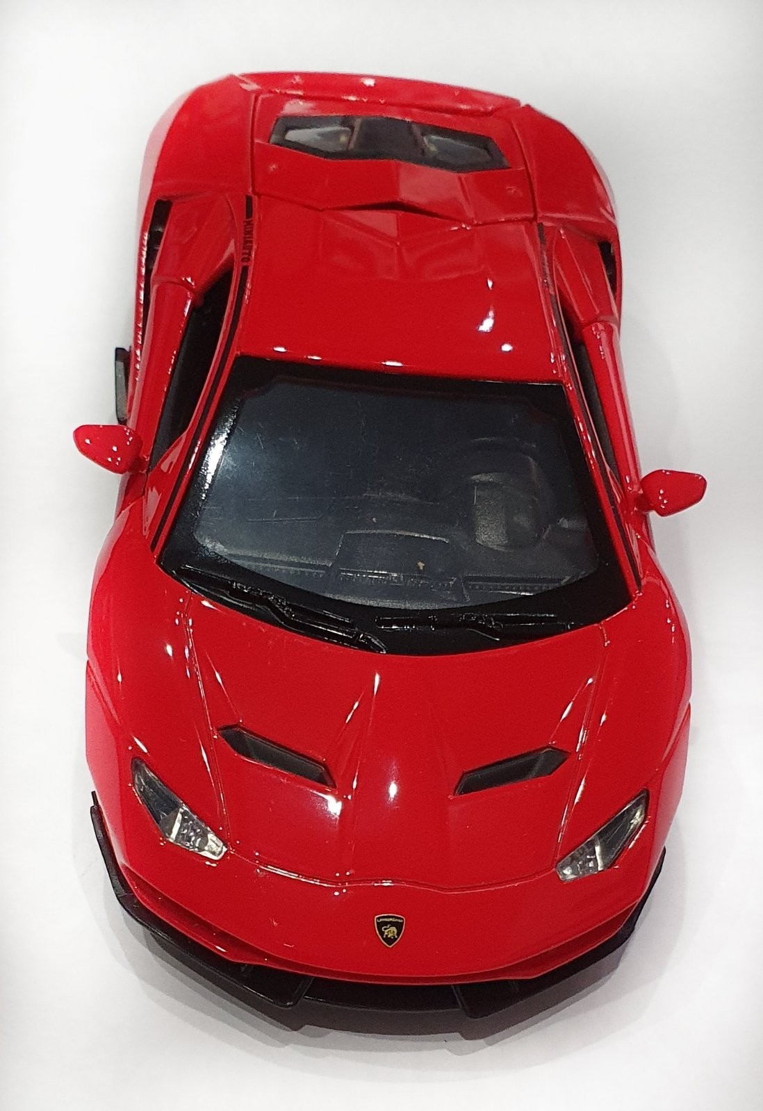 

Модель автомобиля Resteq Lamborghini LP770 1:32 металлическая, инерционная машинка, звук, свет фар, красная (1138857822)
