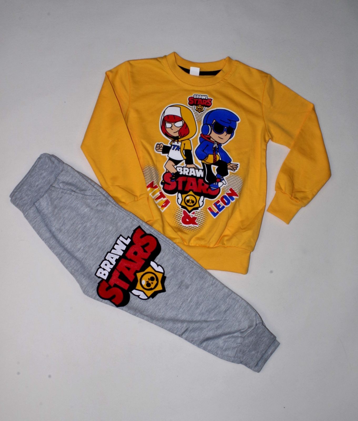 

Спортивний костюм Kids Ciub 404 98-104 см Жовтий з сірим