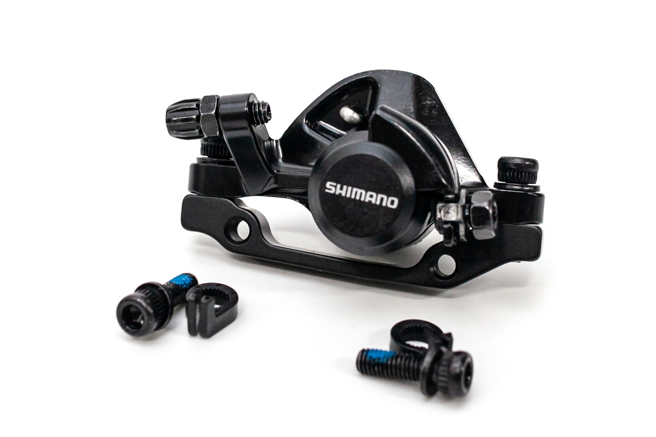 

Тормоз дисковый механический передний SHIMANO BR-TX805 с адаптером под 160 мм.