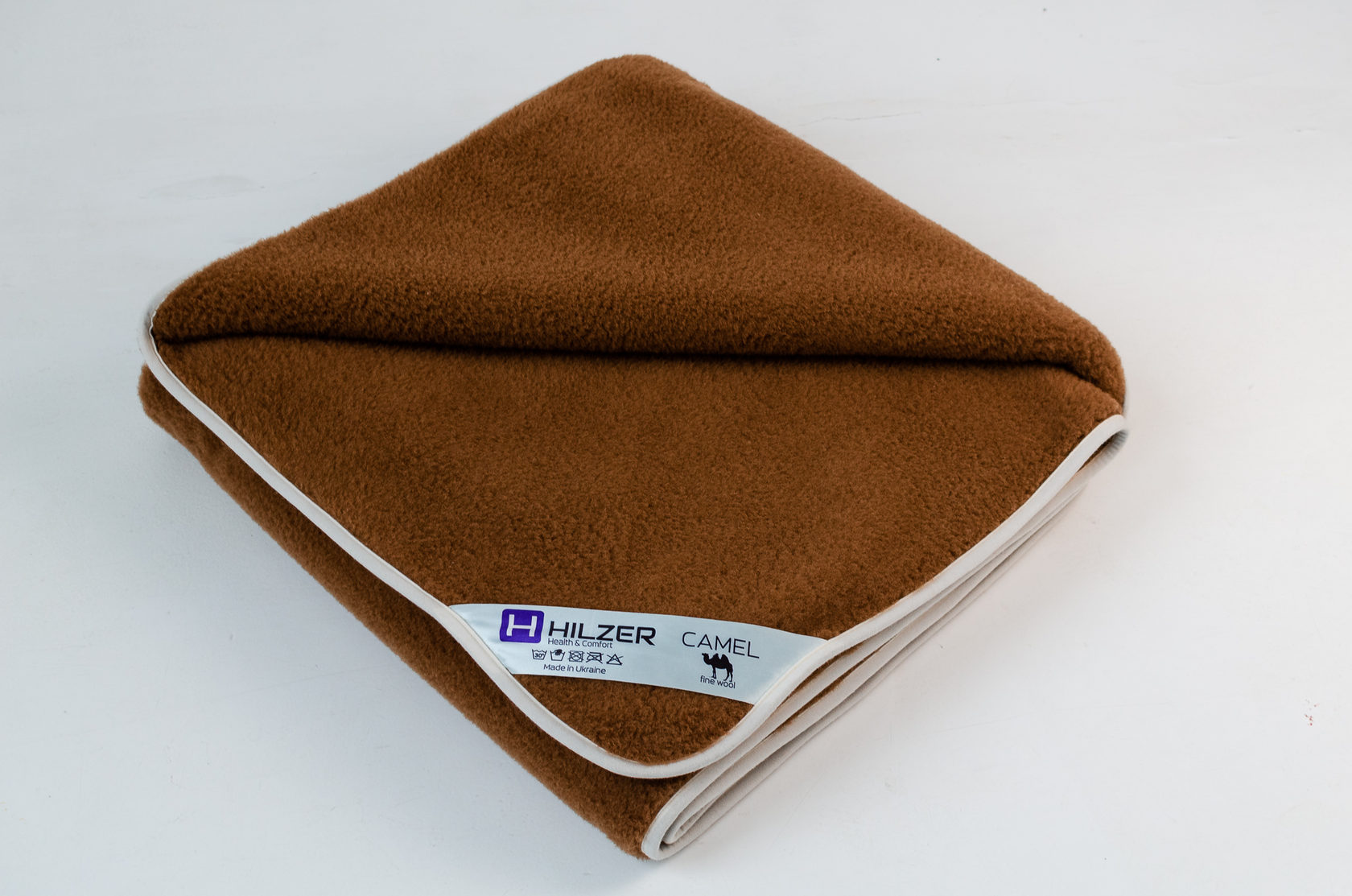 

Комплект постельного белья из шерсти верблюда Woolmark HILZER 1.5-спальный 160х200 см Шерсть/Шерсть + Наматрасник + Подушка ( FB1114038708HZ)