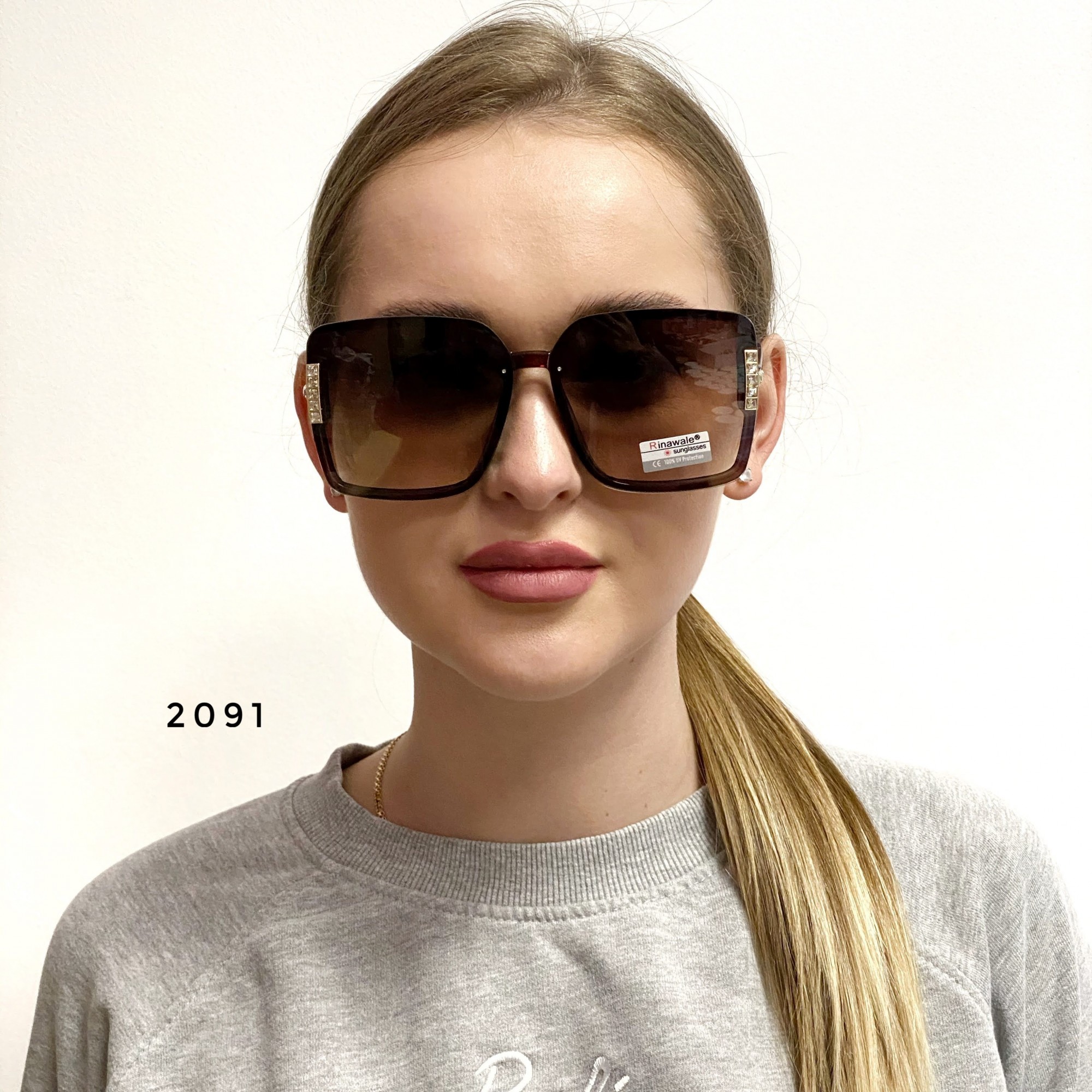 

Солнцезащитные очки женские коричневые 2091