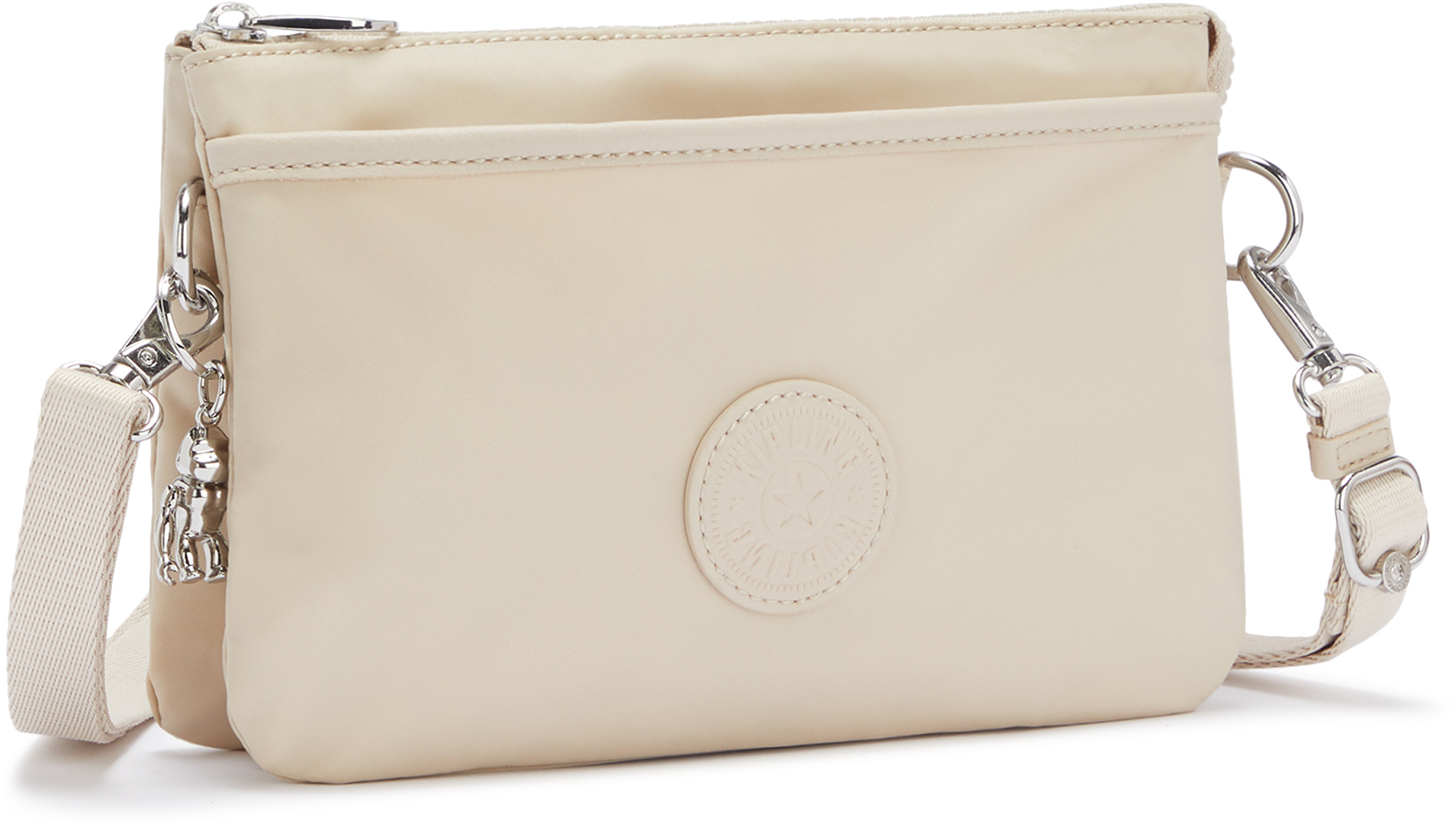 

Сумочка Kipling PAKA + / Dynamic Ivory P RIRI наплечная (3л) (24x16x6,5см) K72323_65L