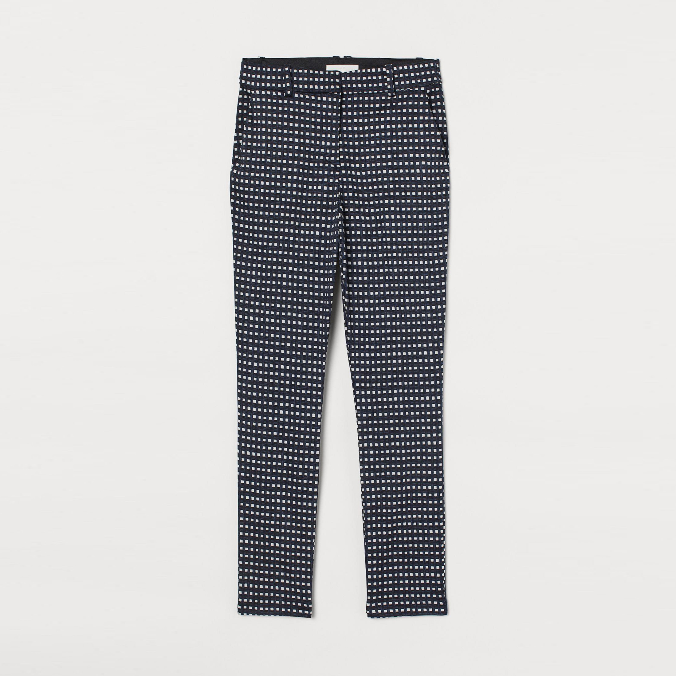 

Брюки H&M 7514711-ACSM 40 Черные с белым и синим
