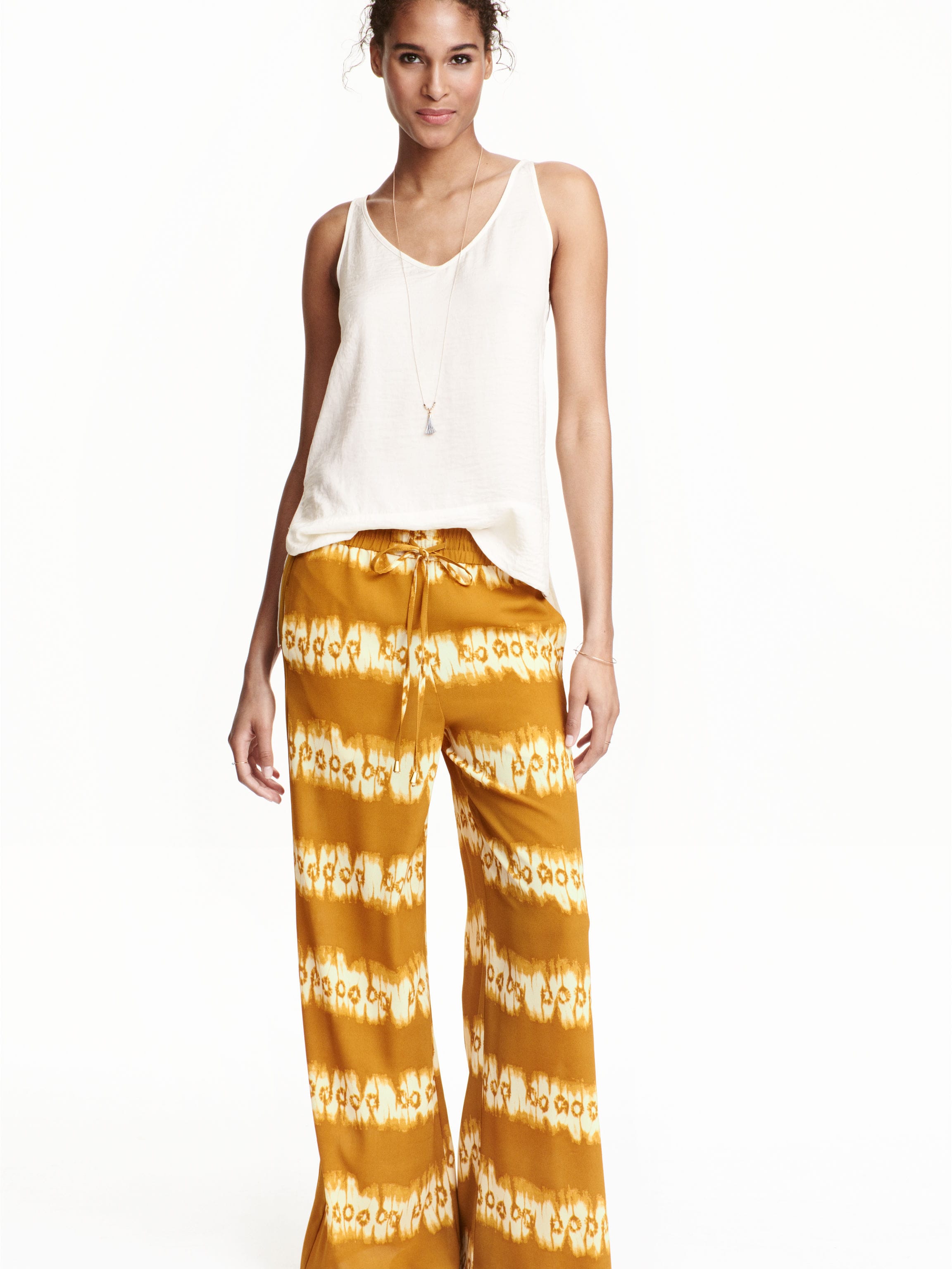 

Брюки H&M 3887953-ABEH 38 Желтые с белым