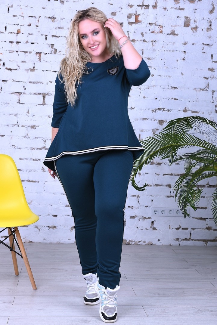 

Костюм двойка трикотажный кофта с асимметричным низом штаны лампас Miss Podium Бутылочный 52