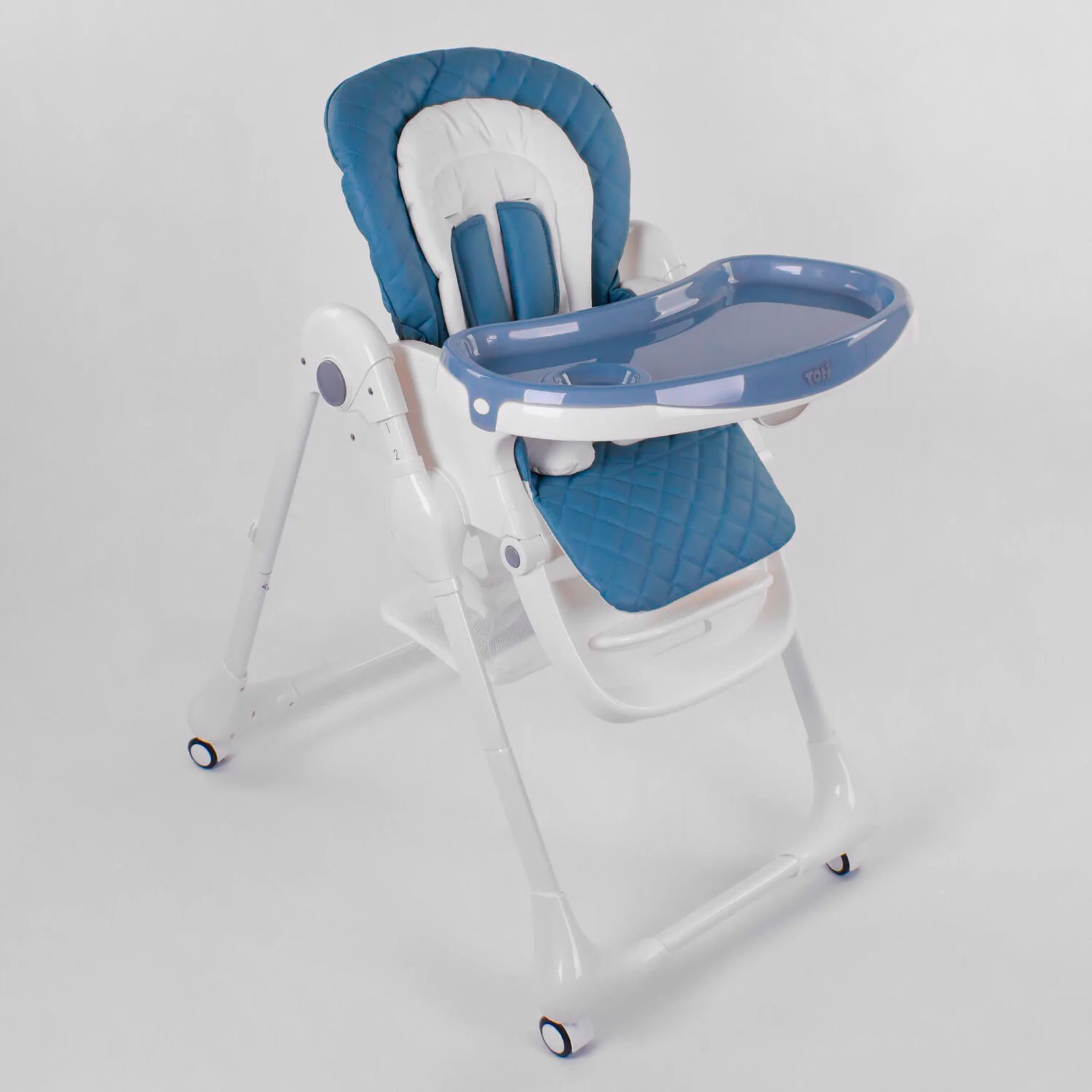 

Стульчик для кормления Toti W-82552 мягкий PU, мягкий вкладыш, 4 колеса, съемный столик, в коробке