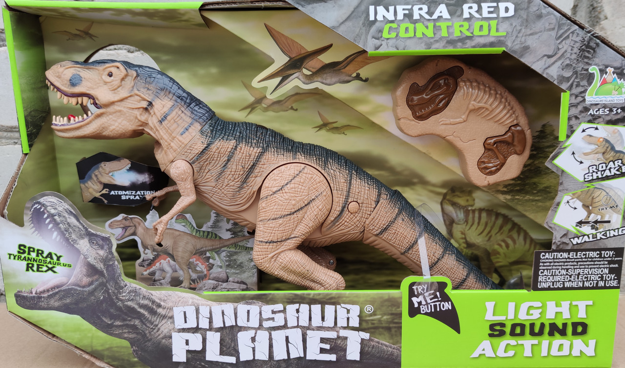 

Интерактивная игрушка динозавр на р/у Gin Dinosaur бежевый звук пар свет ходит