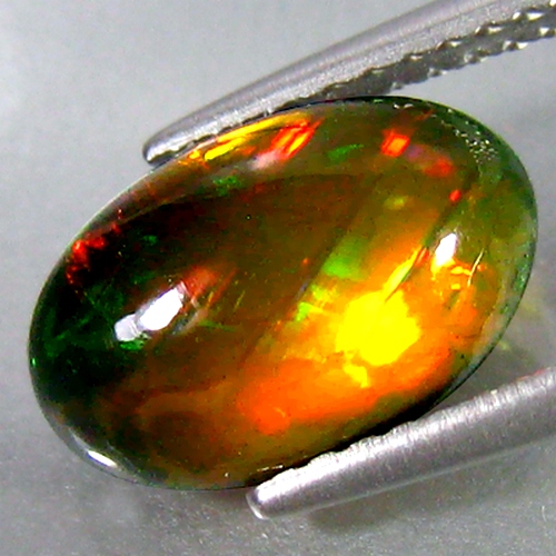 

Опал 11*7.4мм Эфиопия овал 1.71Ct Е1068