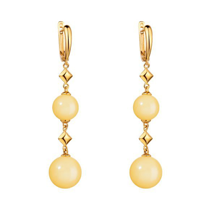 

Серебряные серьги-подвески в позолоте с лимонным янтарем и геометрическими элементами 000099729