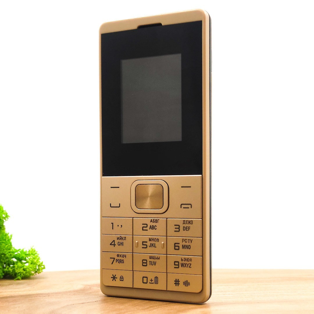 

Кнопочный мобильный телефон с фонариком Dk-Tel 528 Gold