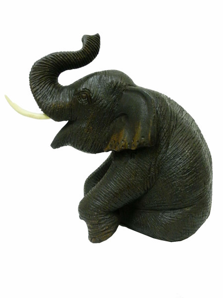 

Слон тиковый сидя, хобот вверх (ст-52)