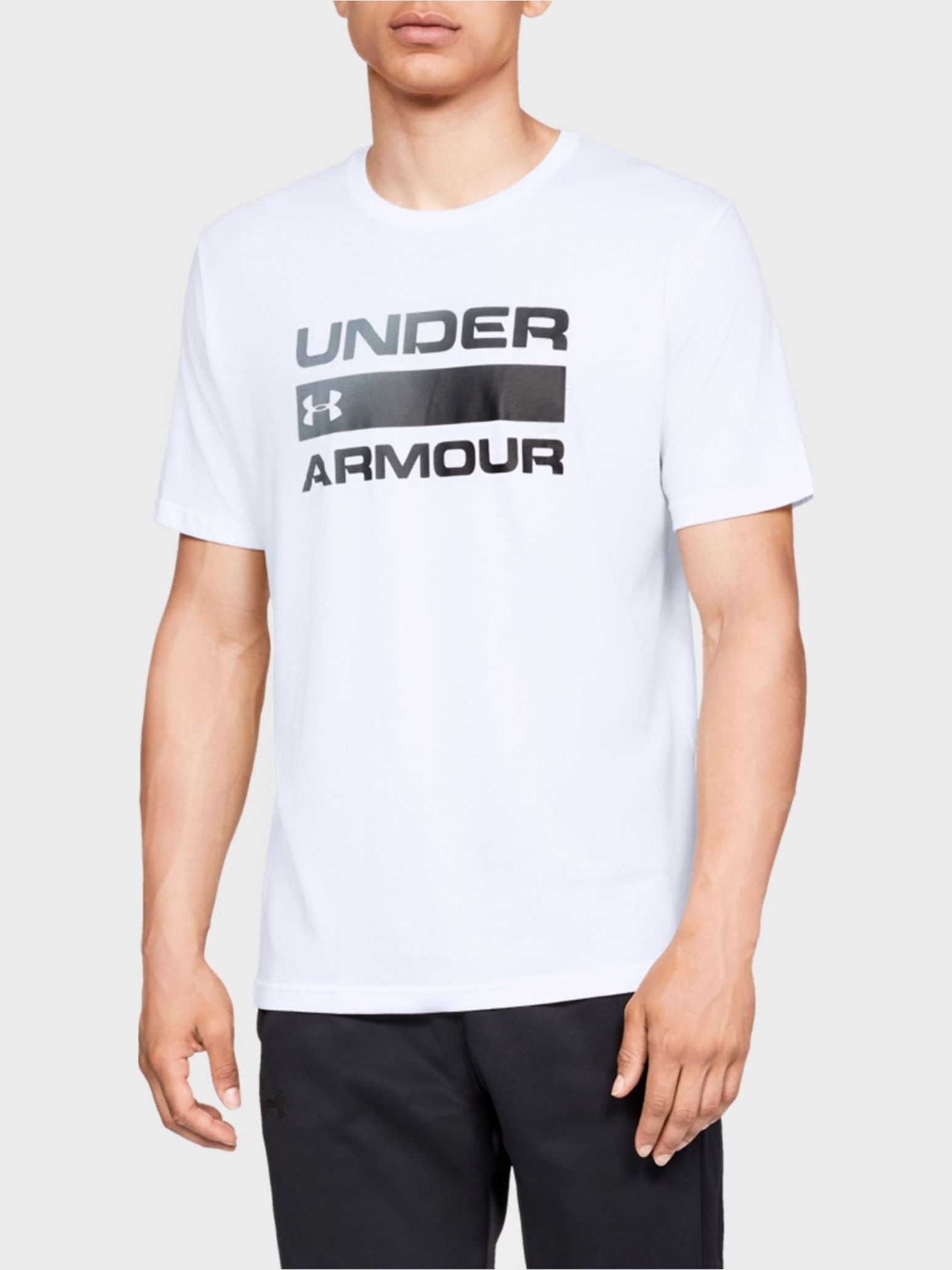 Акція на Футболка довга чоловіча Under Armour Ua Team Issue Wordmark Ss 1329582-100 XL Біла з принтом від Rozetka