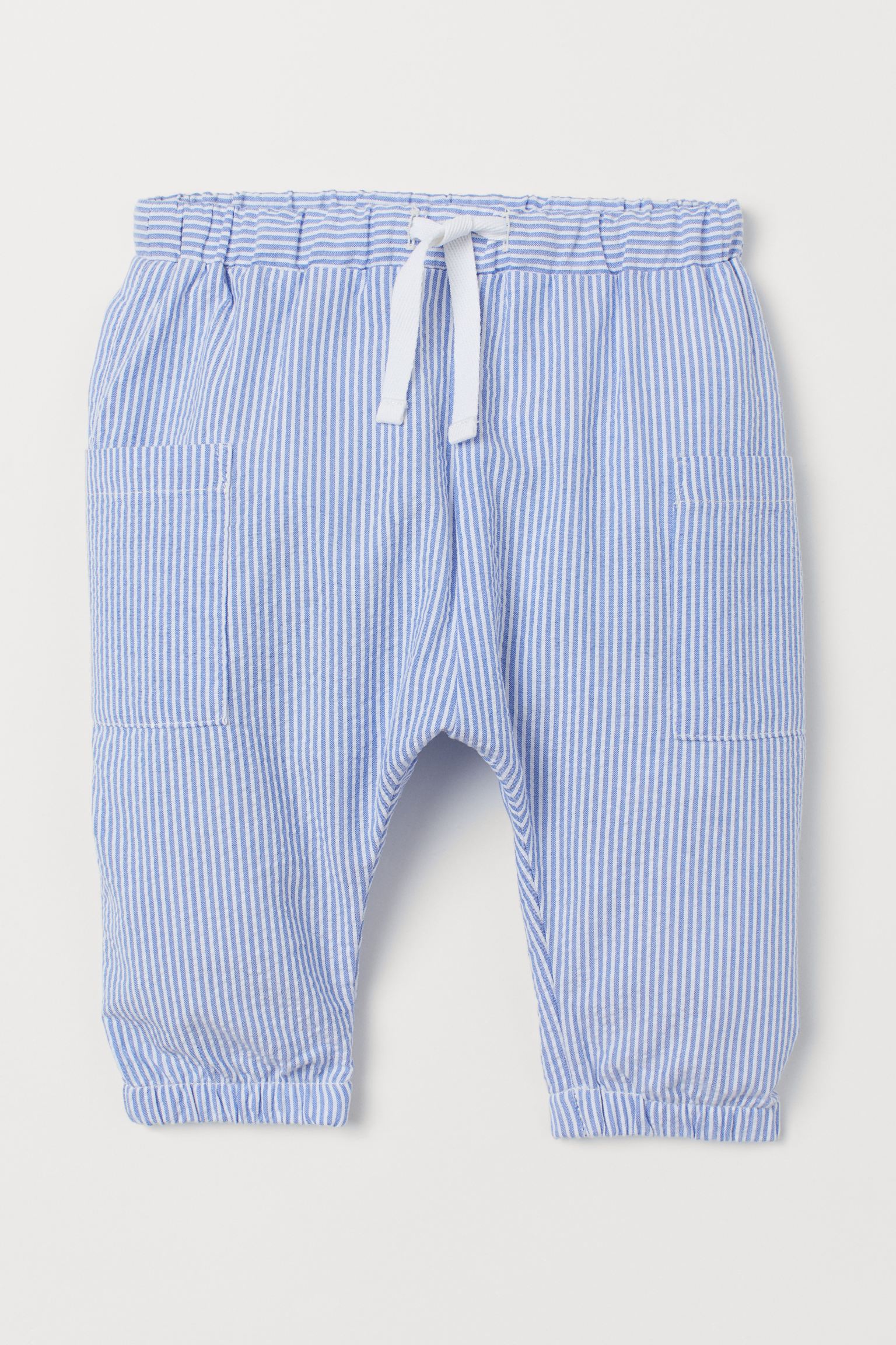 

Брюки H&M 98см бело голубой полоска 26036976439