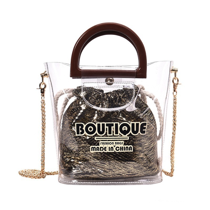 

Сумка женская прозрачная с золотым мешочком Boutique