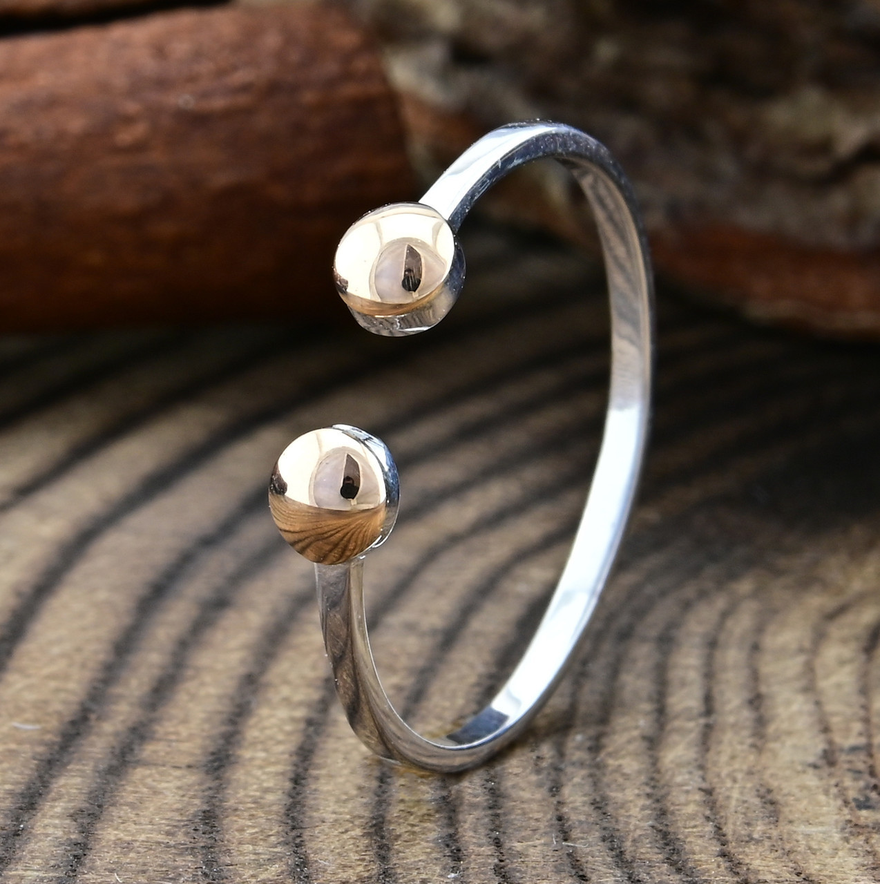 

Серебряное кольцо с золотом Бубочка 15.5
