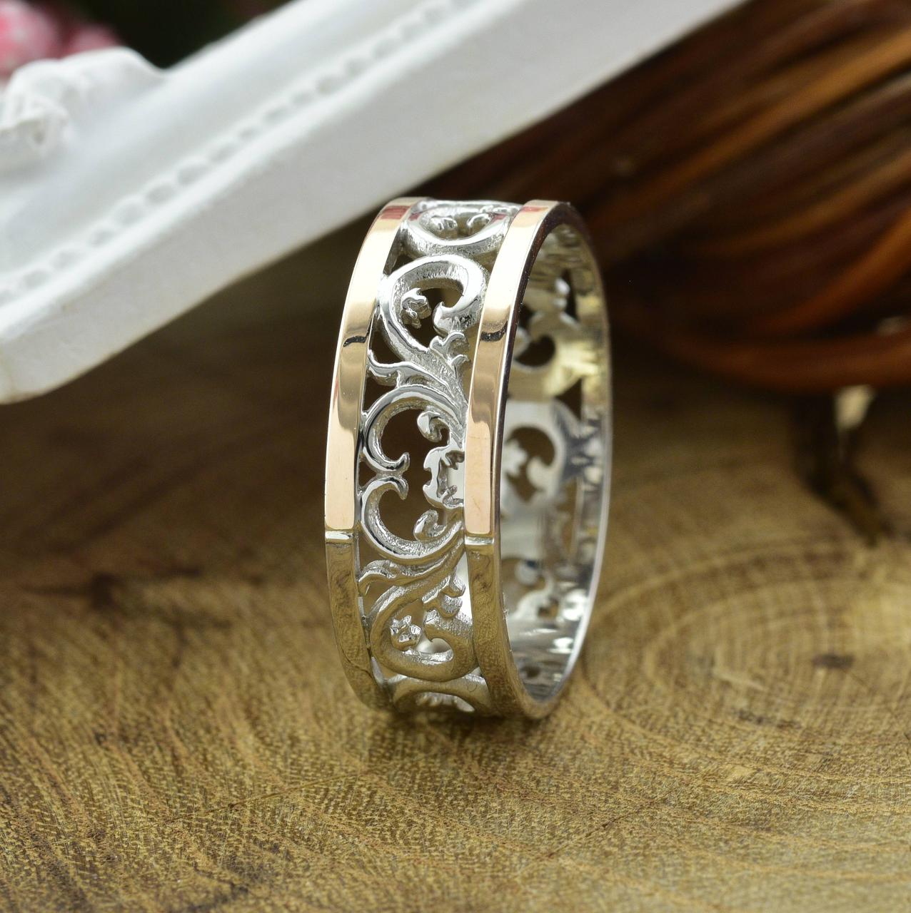 

Серебряное кольцо с золотом БС35121