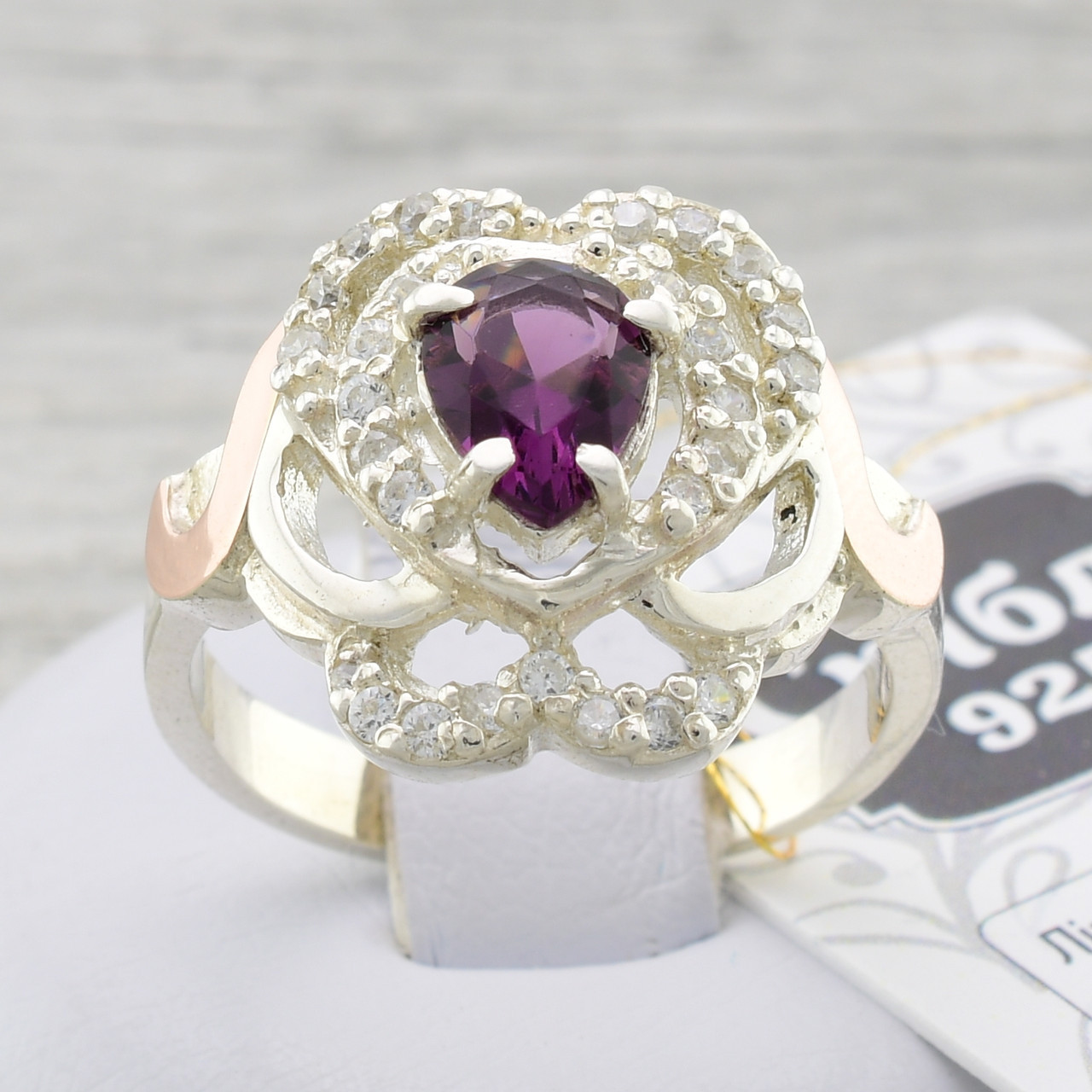 

Серебряное кольцо с золотом Гера вставка фиолетовые фианиты 18
