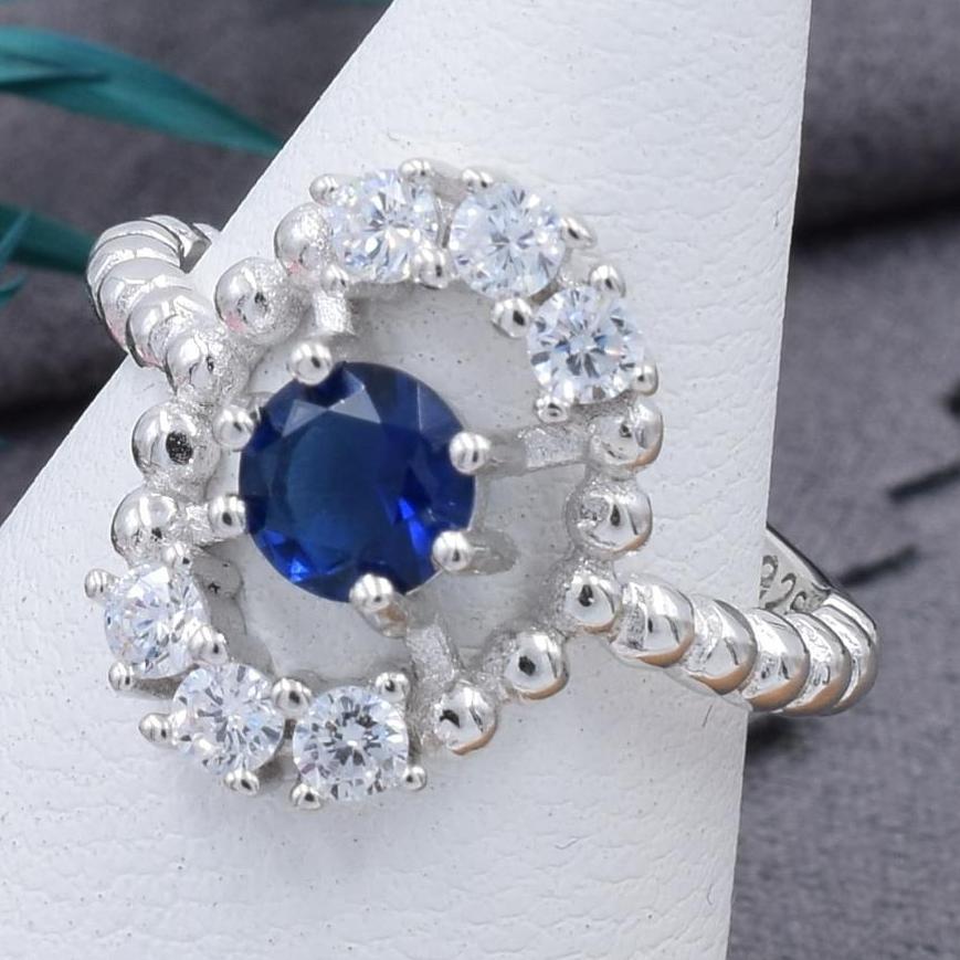 

Серебряное кольцо ширина 15 мм вставка синие фианиты 18