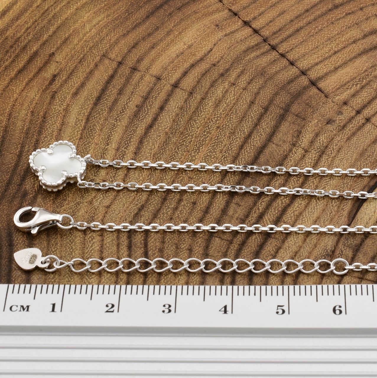 

Серебряное колье длина 38 + 7 см ширина 1 мм вес 3.12 г