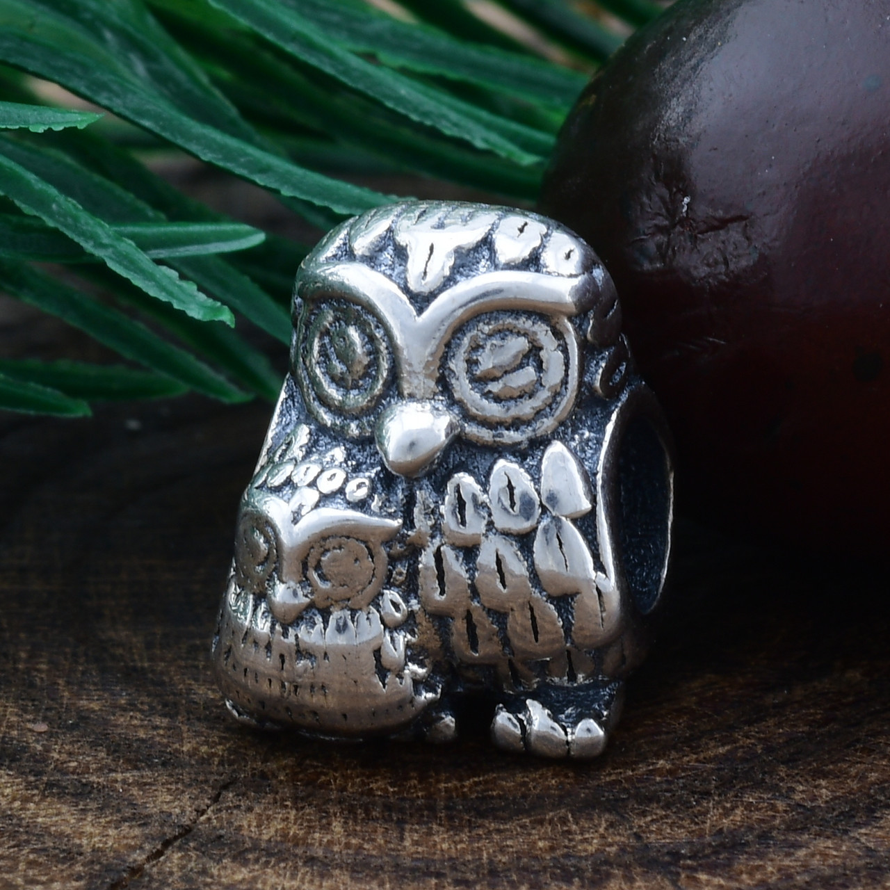 

Серебряный шарм Совушка размер 13х9 мм вес 2.9 г