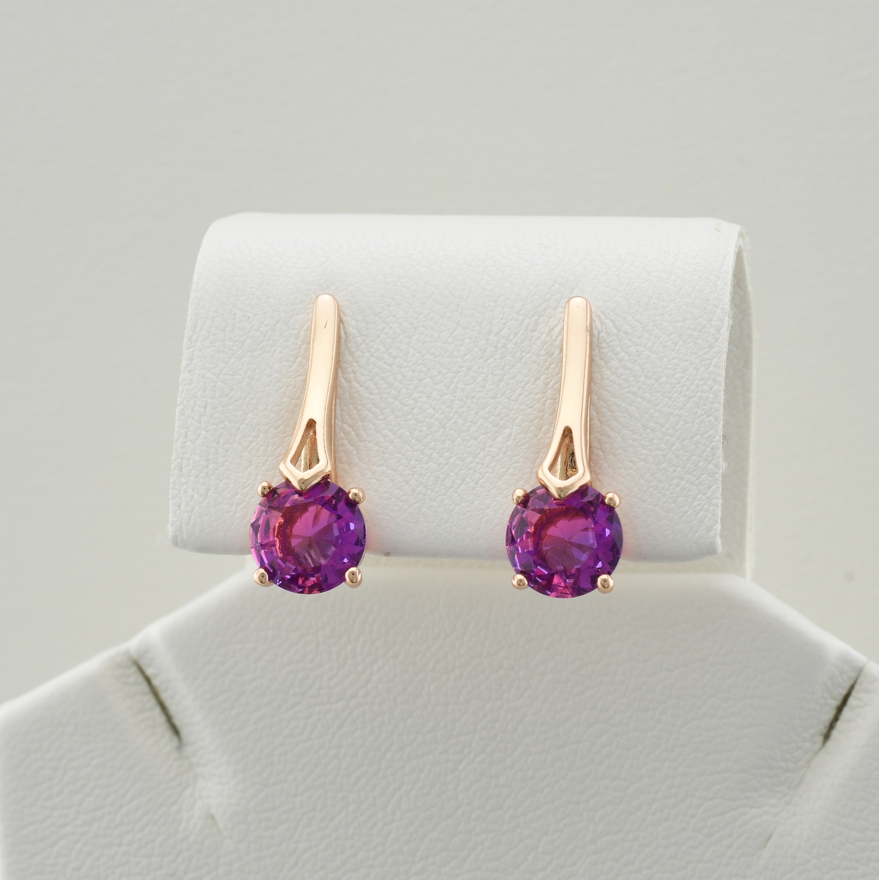 

Сережки Xuping 30185 розмір 19х7 мм пурпурові фіаніти вага 3.0 г позолота 18К