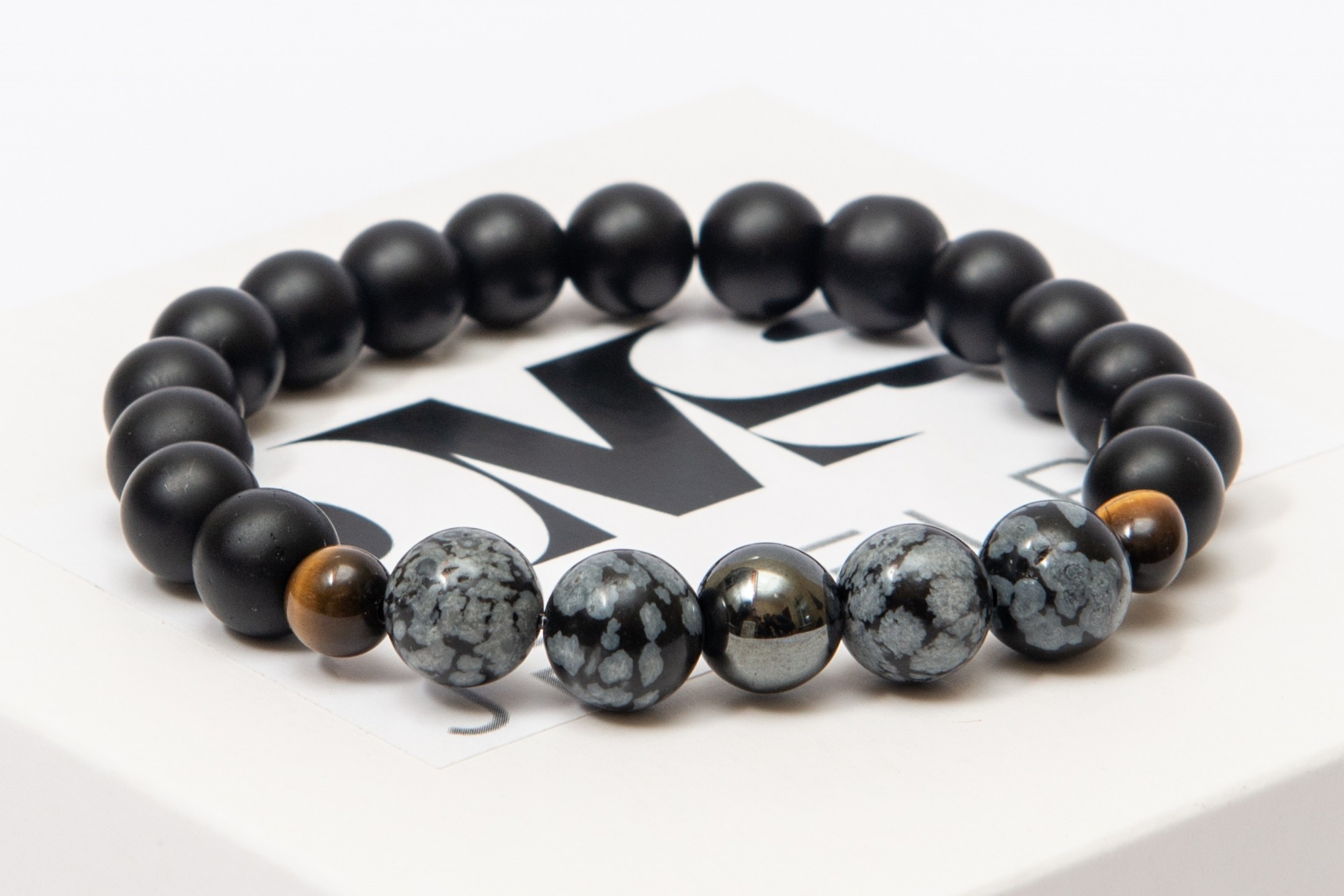 

Браслет DMS Jewelry мужской и женский из натуральных камней Ø 8мм: шунгит, гематит (синт.), тигровый глаз, снежный обсидиан POWER BRACELET