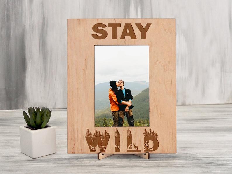 

Подарочная рамка для фото из натурального дерева с гравировкой "Stay wild" 15х21, вертикальная, Светлое дерево, WOODPRESENT